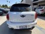 2015 White /BLACK Mini Countryman S (WMWZC3C5XFW) with an 1.6L L4 DOHC 16V TURBO engine, located at 30 S. Berkeley Avenue, Pasadena, CA, 91107, (626) 248-7567, 34.145447, -118.109398 - Photo#2