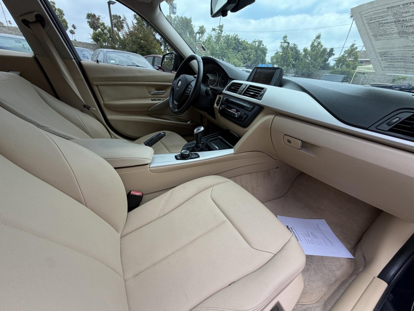 2013 BLUE BMW 3-Series 320i Sedan (WBA3B1C54DF) with an 2.0L L4 DOHC 16V engine, located at 30 S. Berkeley Avenue, Pasadena, CA, 91107, (626) 248-7567, 34.145447, -118.109398 - Photo#12