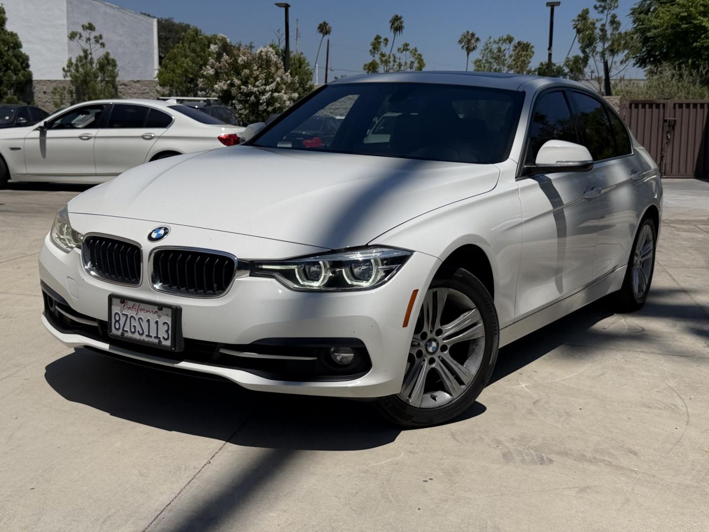 2018 Black /White BMW 3-Series 330i SULEV Sedan (WBA8B9C54JE) with an 3.0L L6 DOHC 24V engine, 8A transmission, located at 30 S. Berkeley Avenue, Pasadena, CA, 91107, (626) 248-7567, 34.145447, -118.109398 - Crown City Motors is a used “Buy Here Pay Here” car dealer in Pasadena CA. “Buy Here Pay Here” financing, means that when you purchase your vehicle from our dealership, that you make the payments to the dealership as well. We do not need the banks approval to get you approved for a used auto- Photo#0