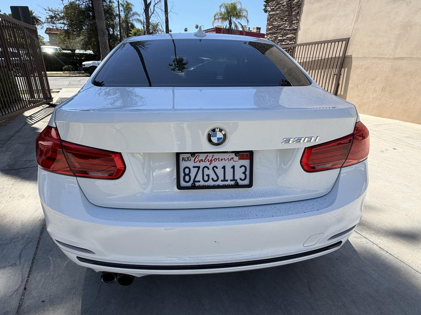 2018 Black /White BMW 3-Series 330i SULEV Sedan (WBA8B9C54JE) with an 3.0L L6 DOHC 24V engine, 8A transmission, located at 30 S. Berkeley Avenue, Pasadena, CA, 91107, (626) 248-7567, 34.145447, -118.109398 - Crown City Motors is a used “Buy Here Pay Here” car dealer in Pasadena CA. “Buy Here Pay Here” financing, means that when you purchase your vehicle from our dealership, that you make the payments to the dealership as well. We do not need the banks approval to get you approved for a used auto- Photo#3