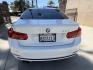 2018 Black /White BMW 3-Series 330i SULEV Sedan (WBA8B9C54JE) with an 3.0L L6 DOHC 24V engine, 8A transmission, located at 30 S. Berkeley Avenue, Pasadena, CA, 91107, (626) 248-7567, 34.145447, -118.109398 - Crown City Motors is a used “Buy Here Pay Here” car dealer in Pasadena CA. “Buy Here Pay Here” financing, means that when you purchase your vehicle from our dealership, that you make the payments to the dealership as well. We do not need the banks approval to get you approved for a used auto- Photo#3