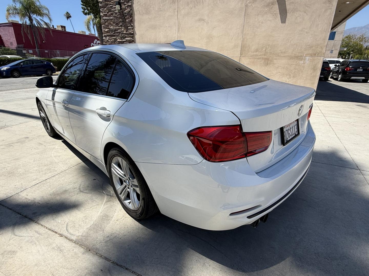 2018 Black /White BMW 3-Series 330i SULEV Sedan (WBA8B9C54JE) with an 3.0L L6 DOHC 24V engine, 8A transmission, located at 30 S. Berkeley Avenue, Pasadena, CA, 91107, (626) 248-7567, 34.145447, -118.109398 - Crown City Motors is a used “Buy Here Pay Here” car dealer in Pasadena CA. “Buy Here Pay Here” financing, means that when you purchase your vehicle from our dealership, that you make the payments to the dealership as well. We do not need the banks approval to get you approved for a used auto- Photo#4