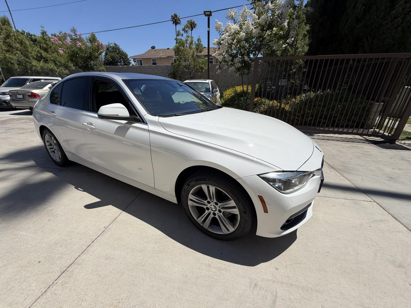 2018 Black /White BMW 3-Series 330i SULEV Sedan (WBA8B9C54JE) with an 3.0L L6 DOHC 24V engine, 8A transmission, located at 30 S. Berkeley Avenue, Pasadena, CA, 91107, (626) 248-7567, 34.145447, -118.109398 - Crown City Motors is a used “Buy Here Pay Here” car dealer in Pasadena CA. “Buy Here Pay Here” financing, means that when you purchase your vehicle from our dealership, that you make the payments to the dealership as well. We do not need the banks approval to get you approved for a used auto- Photo#8