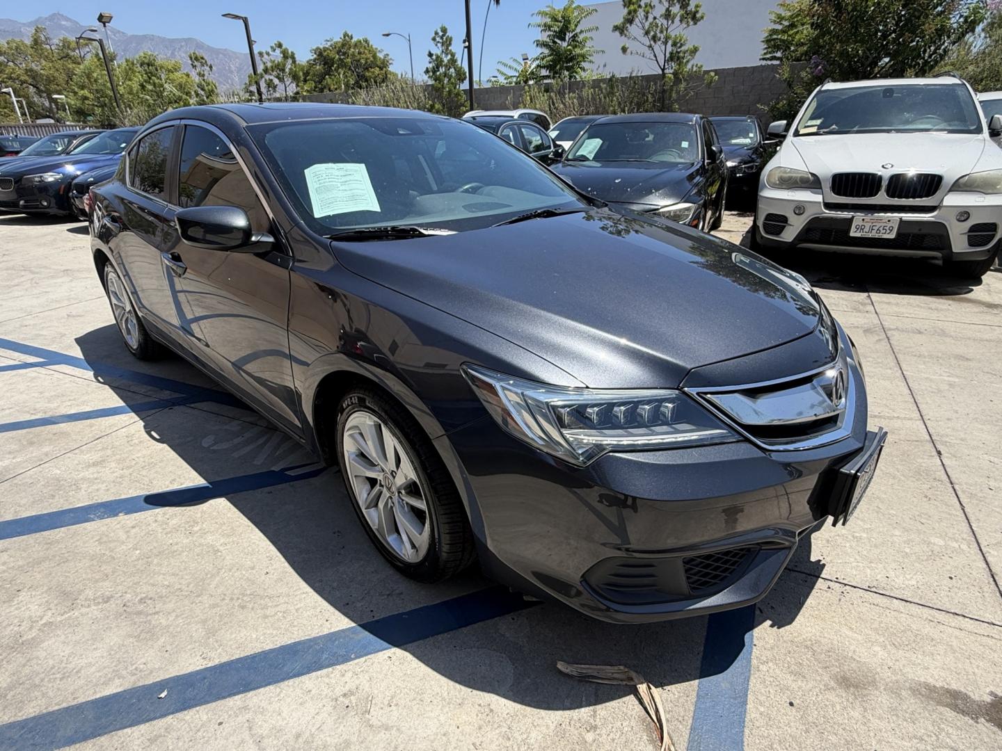 2016 Gray metallic /Black Acura ILX 8-Spd AT (19UDE2F37GA) with an 2.0L L4 16V DOHC engine, 8-Speed Automatic transmission, located at 30 S. Berkeley Avenue, Pasadena, CA, 91107, (626) 248-7567, 34.145447, -118.109398 - # 2016 Acura ILX For Sale in Pasadena, CA – Buy Here Pay Here Financing Available If you're looking for a dependable luxury sedan with excellent fuel economy, premium features, and flexible financing options, this 2016 Acura ILX is an outstanding choice. Available now at Crown City Motors in Pa- Photo#5