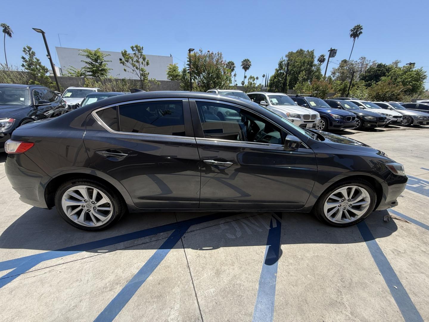 2016 Gray metallic /Black Acura ILX 8-Spd AT (19UDE2F37GA) with an 2.0L L4 16V DOHC engine, 8-Speed Automatic transmission, located at 30 S. Berkeley Avenue, Pasadena, CA, 91107, (626) 248-7567, 34.145447, -118.109398 - # 2016 Acura ILX For Sale in Pasadena, CA – Buy Here Pay Here Financing Available If you're looking for a dependable luxury sedan with excellent fuel economy, premium features, and flexible financing options, this 2016 Acura ILX is an outstanding choice. Available now at Crown City Motors in Pa- Photo#4