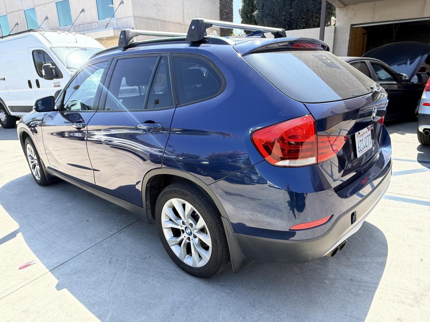 2014 Black /Black BMW X1 sDrive28i (WBAVM1C58EV) with an 2.0L L4 DOHC 16V engine, 8-Speed Automatic transmission, located at 30 S. Berkeley Avenue, Pasadena, CA, 91107, (626) 248-7567, 34.145447, -118.109398 - 2014 BMW X1 sDrive28i for Sale in Pasadena CA – Buy Here Pay Here BMW Financing – Bad Credit Auto Loans – In House Financing Available Looking for a 2014 BMW X1 for sale in Pasadena, California? Crown City Motors is proud to offer this beautiful 2014 BMW X1 sDrive28i luxury SUV with Navigat- Photo#2