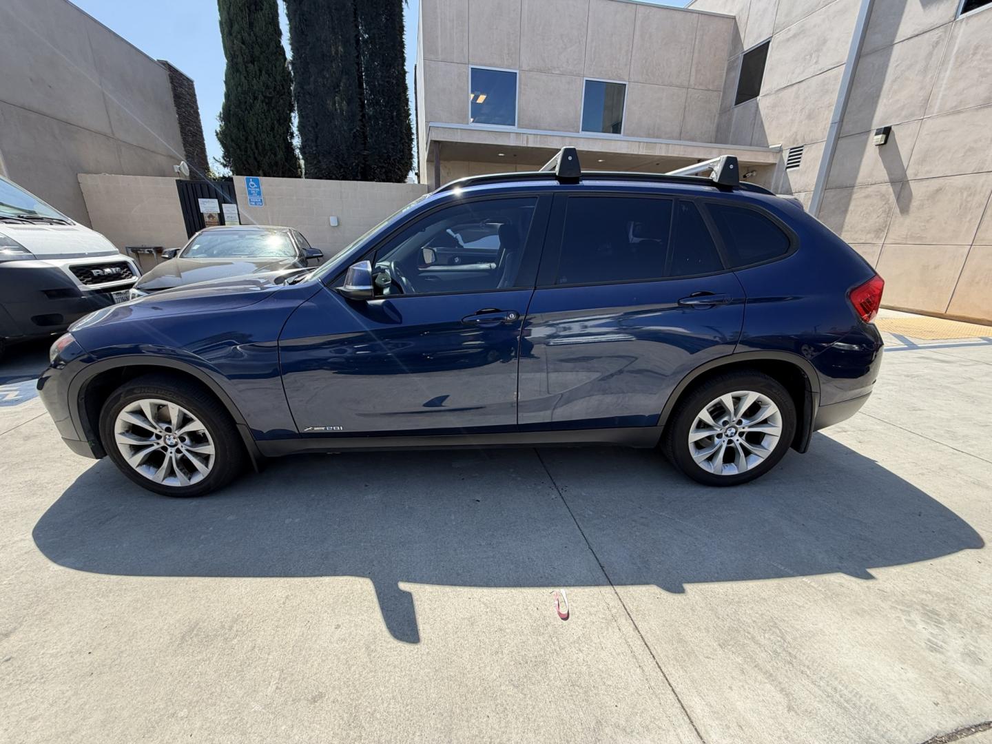 2014 Black /Black BMW X1 sDrive28i (WBAVM1C58EV) with an 2.0L L4 DOHC 16V engine, 8-Speed Automatic transmission, located at 30 S. Berkeley Avenue, Pasadena, CA, 91107, (626) 248-7567, 34.145447, -118.109398 - 2014 BMW X1 sDrive28i for Sale in Pasadena CA – Buy Here Pay Here BMW Financing – Bad Credit Auto Loans – In House Financing Available Looking for a 2014 BMW X1 for sale in Pasadena, California? Crown City Motors is proud to offer this beautiful 2014 BMW X1 sDrive28i luxury SUV with Navigat- Photo#1