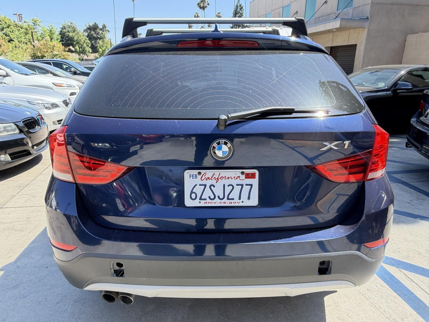 2014 Black /Black BMW X1 sDrive28i (WBAVM1C58EV) with an 2.0L L4 DOHC 16V engine, 8-Speed Automatic transmission, located at 30 S. Berkeley Avenue, Pasadena, CA, 91107, (626) 248-7567, 34.145447, -118.109398 - 2014 BMW X1 sDrive28i for Sale in Pasadena CA – Buy Here Pay Here BMW Financing – Bad Credit Auto Loans – In House Financing Available Looking for a 2014 BMW X1 for sale in Pasadena, California? Crown City Motors is proud to offer this beautiful 2014 BMW X1 sDrive28i luxury SUV with Navigat- Photo#3