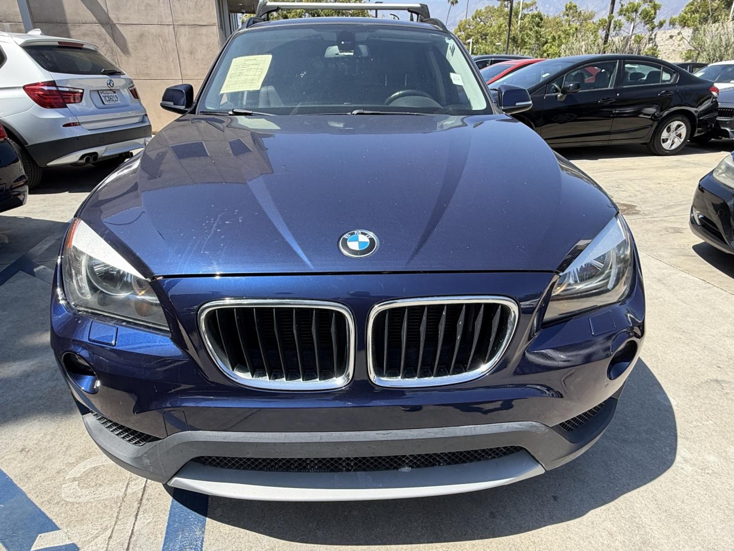 2014 Black /Black BMW X1 sDrive28i (WBAVM1C58EV) with an 2.0L L4 DOHC 16V engine, 8-Speed Automatic transmission, located at 30 S. Berkeley Avenue, Pasadena, CA, 91107, (626) 248-7567, 34.145447, -118.109398 - 2014 BMW X1 sDrive28i for Sale in Pasadena CA – Buy Here Pay Here BMW Financing – Bad Credit Auto Loans – In House Financing Available Looking for a 2014 BMW X1 for sale in Pasadena, California? Crown City Motors is proud to offer this beautiful 2014 BMW X1 sDrive28i luxury SUV with Navigat- Photo#4