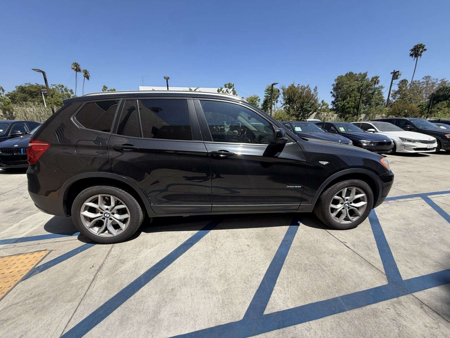 2012 Black /black BMW X3 xDrive28i (5UXWX5C54CL) with an 3.0L L6 DOHC 24V engine, 8-Speed Automatic transmission, located at 30 S. Berkeley Avenue, Pasadena, CA, 91107, (626) 248-7567, 34.145447, -118.109398 - Crown City Motors is a used “Buy Here Pay Here” car dealer in Pasadena CA. “Buy Here Pay Here” financing, means that when you purchase your vehicle from our dealership, that you make the payments to the dealership as well. We do not need the banks approval to get you approved for a used au- Photo#5
