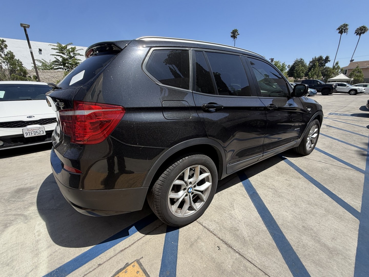 2012 Black /black BMW X3 xDrive28i (5UXWX5C54CL) with an 3.0L L6 DOHC 24V engine, 8-Speed Automatic transmission, located at 30 S. Berkeley Avenue, Pasadena, CA, 91107, (626) 248-7567, 34.145447, -118.109398 - Crown City Motors is a used “Buy Here Pay Here” car dealer in Pasadena CA. “Buy Here Pay Here” financing, means that when you purchase your vehicle from our dealership, that you make the payments to the dealership as well. We do not need the banks approval to get you approved for a used au- Photo#4