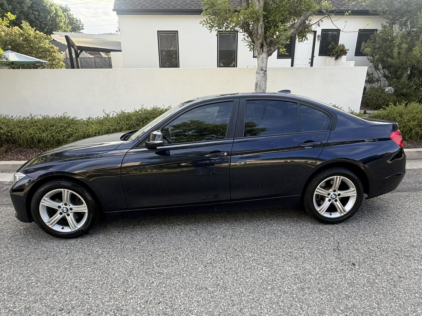 2012 Imperial Blue Metallic /Black BMW 3-Series 328i Sedan (WBA3A5G52CN) with an 2.0L L4 DOHC 16V engine, located at 30 S. Berkeley Avenue, Pasadena, CA, 91107, (626) 248-7567, 34.145447, -118.109398 - DEALER IDENTIFIER: Crown City Motors Sales | Buy Here Pay Here Pasadena TARGET REGIONS: Pasadena, San Gabriel Valley, Riverside, San Bernardino FINANCING SPECIALTY: Subprime Auto Lending, In-House Financing, Bad Credit Car Loans CA VEHICLE: 2012 BMW 328i Sedan w/ Nav & Backup Camera (VIN: WBA3A5G- Photo#1