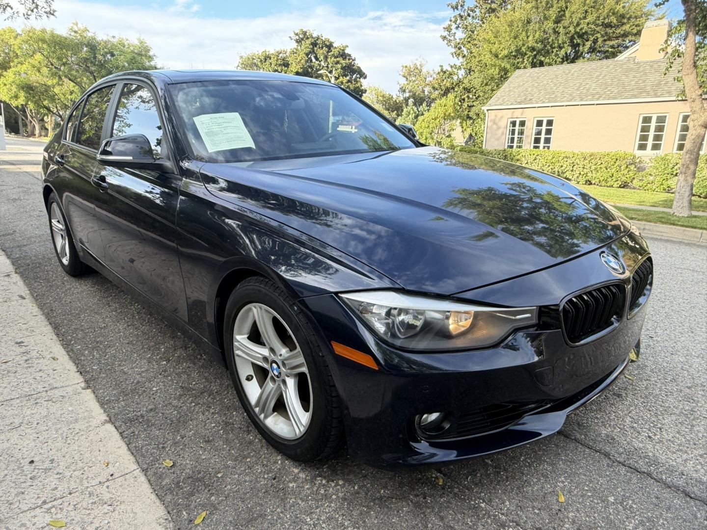 2012 Imperial Blue Metallic /Black BMW 3-Series 328i Sedan (WBA3A5G52CN) with an 2.0L L4 DOHC 16V engine, located at 30 S. Berkeley Avenue, Pasadena, CA, 91107, (626) 248-7567, 34.145447, -118.109398 - DEALER IDENTIFIER: Crown City Motors Sales | Buy Here Pay Here Pasadena TARGET REGIONS: Pasadena, San Gabriel Valley, Riverside, San Bernardino FINANCING SPECIALTY: Subprime Auto Lending, In-House Financing, Bad Credit Car Loans CA VEHICLE: 2012 BMW 328i Sedan w/ Nav & Backup Camera (VIN: WBA3A5G- Photo#5