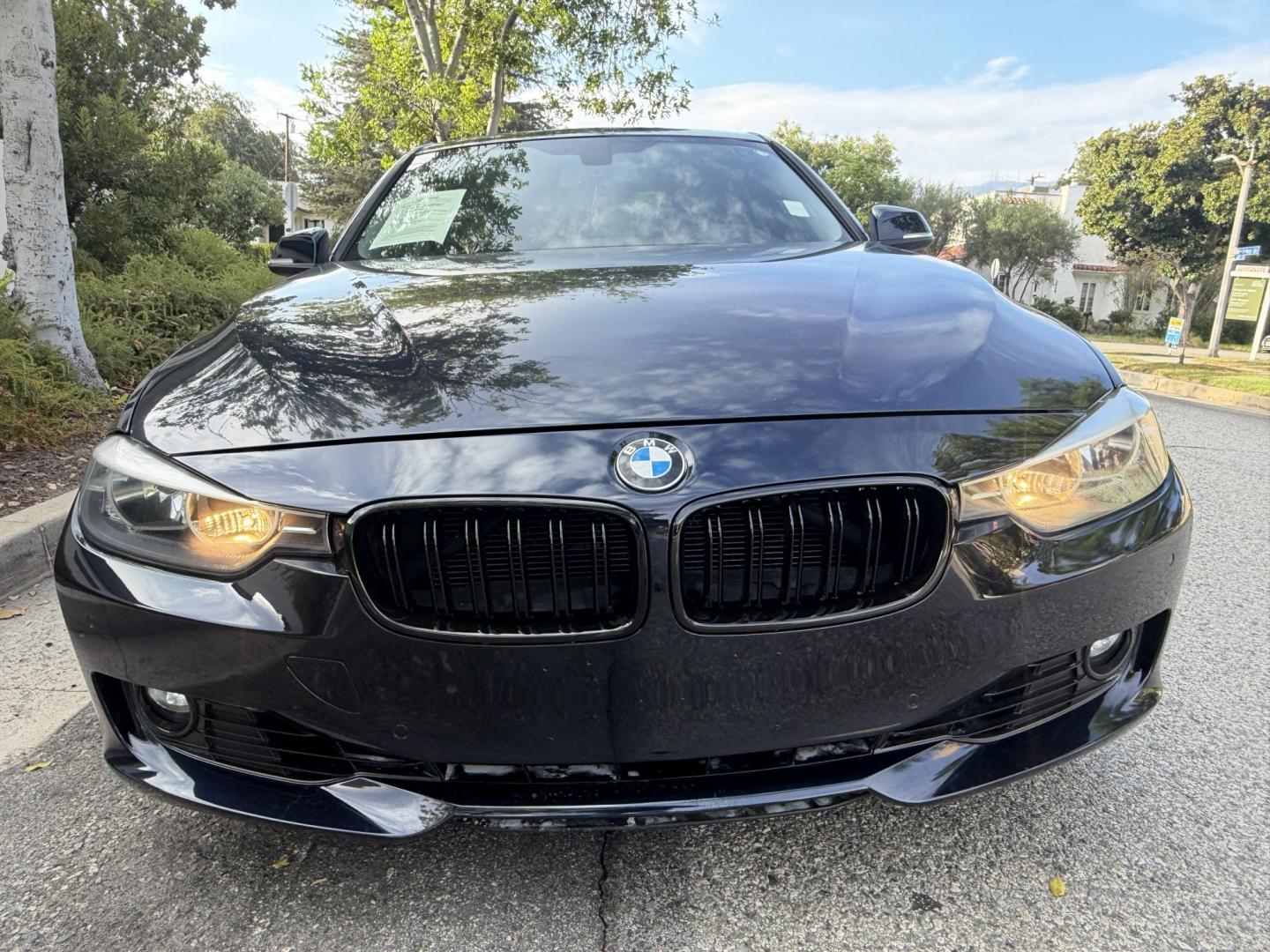 2012 Imperial Blue Metallic /Black BMW 3-Series 328i Sedan (WBA3A5G52CN) with an 2.0L L4 DOHC 16V engine, located at 30 S. Berkeley Avenue, Pasadena, CA, 91107, (626) 248-7567, 34.145447, -118.109398 - DEALER IDENTIFIER: Crown City Motors Sales | Buy Here Pay Here Pasadena TARGET REGIONS: Pasadena, San Gabriel Valley, Riverside, San Bernardino FINANCING SPECIALTY: Subprime Auto Lending, In-House Financing, Bad Credit Car Loans CA VEHICLE: 2012 BMW 328i Sedan w/ Nav & Backup Camera (VIN: WBA3A5G- Photo#8