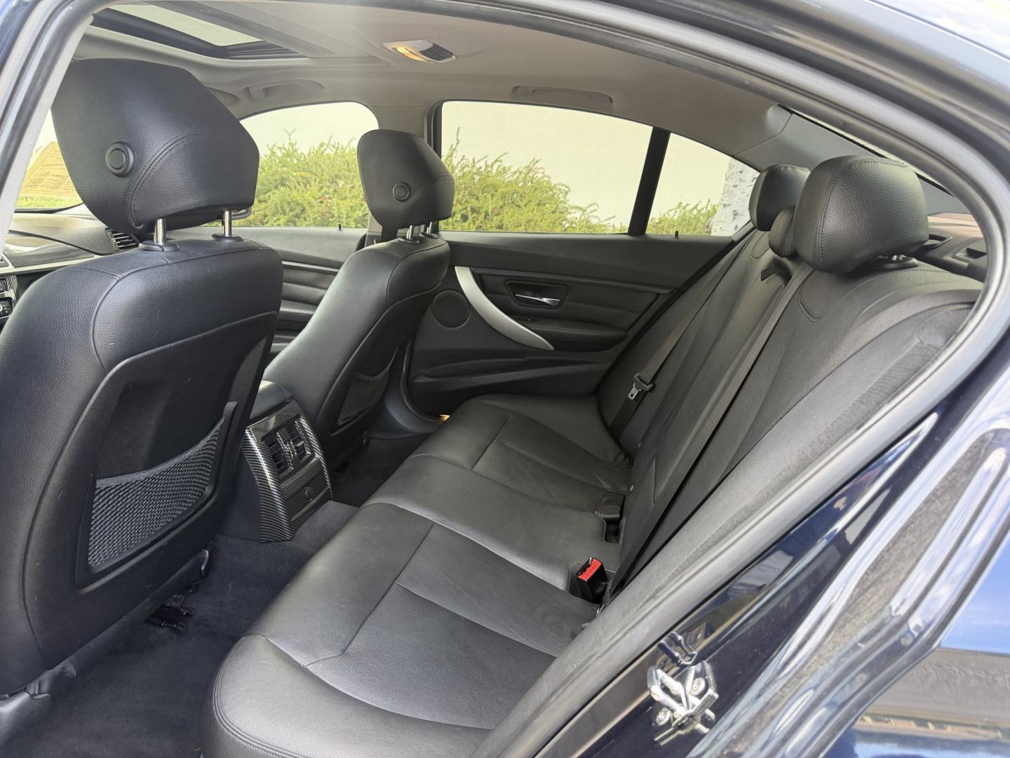 2012 Imperial Blue Metallic /Black BMW 3-Series 328i Sedan (WBA3A5G52CN) with an 2.0L L4 DOHC 16V engine, located at 30 S. Berkeley Avenue, Pasadena, CA, 91107, (626) 248-7567, 34.145447, -118.109398 - DEALER IDENTIFIER: Crown City Motors Sales | Buy Here Pay Here Pasadena TARGET REGIONS: Pasadena, San Gabriel Valley, Riverside, San Bernardino FINANCING SPECIALTY: Subprime Auto Lending, In-House Financing, Bad Credit Car Loans CA VEHICLE: 2012 BMW 328i Sedan w/ Nav & Backup Camera (VIN: WBA3A5G- Photo#12