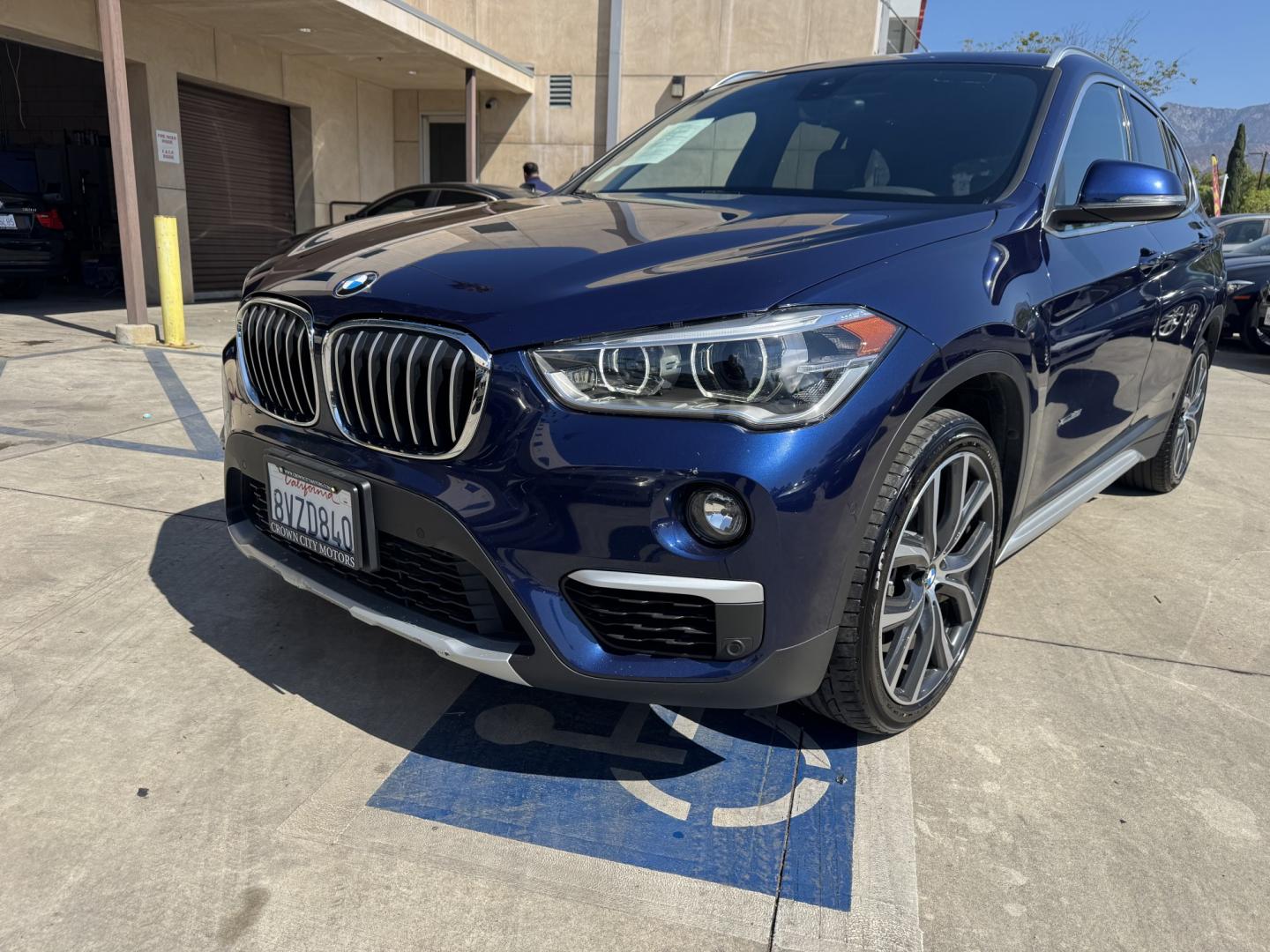 2018 Mediterranean Blue Metallic /Black BMW X1 xDrive28i (WBXHT3C32J5) with an 2.0L L4 DOHC 16V engine, 8A transmission, located at 30 S. Berkeley Avenue, Pasadena, CA, 91107, (626) 248-7567, 34.145447, -118.109398 - Decoding VIN WBXHT3C32J5K23620: Vehicle: 2018 BMW X1 sDrive28i (F48 Generation) Engine: 2.0L TwinPower Turbo Inline 4-Cylinder Drivetrain: Front-Wheel Drive (FWD / sDrive) Body Style: Premium Compact Luxury Sports Activity Vehicle (SAV / Crossover) A late-model luxury crossover like t- Photo#1