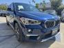 2018 Mediterranean Blue Metallic /Black BMW X1 xDrive28i (WBXHT3C32J5) with an 2.0L L4 DOHC 16V engine, 8A transmission, located at 30 S. Berkeley Avenue, Pasadena, CA, 91107, (626) 248-7567, 34.145447, -118.109398 - Decoding VIN WBXHT3C32J5K23620: Vehicle: 2018 BMW X1 sDrive28i (F48 Generation) Engine: 2.0L TwinPower Turbo Inline 4-Cylinder Drivetrain: Front-Wheel Drive (FWD / sDrive) Body Style: Premium Compact Luxury Sports Activity Vehicle (SAV / Crossover) A late-model luxury crossover like t- Photo#3