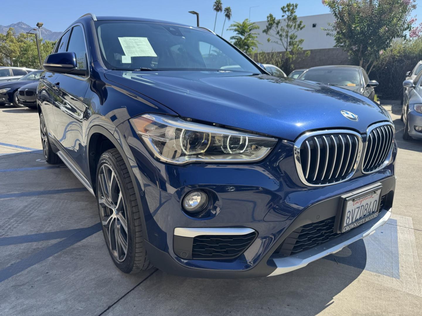2018 Mediterranean Blue Metallic /Black BMW X1 xDrive28i (WBXHT3C32J5) with an 2.0L L4 DOHC 16V engine, 8A transmission, located at 30 S. Berkeley Avenue, Pasadena, CA, 91107, (626) 248-7567, 34.145447, -118.109398 - Decoding VIN WBXHT3C32J5K23620: Vehicle: 2018 BMW X1 sDrive28i (F48 Generation) Engine: 2.0L TwinPower Turbo Inline 4-Cylinder Drivetrain: Front-Wheel Drive (FWD / sDrive) Body Style: Premium Compact Luxury Sports Activity Vehicle (SAV / Crossover) A late-model luxury crossover like t- Photo#8
