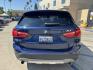 2018 Mediterranean Blue Metallic /Black BMW X1 xDrive28i (WBXHT3C32J5) with an 2.0L L4 DOHC 16V engine, 8A transmission, located at 30 S. Berkeley Avenue, Pasadena, CA, 91107, (626) 248-7567, 34.145447, -118.109398 - Decoding VIN WBXHT3C32J5K23620: Vehicle: 2018 BMW X1 sDrive28i (F48 Generation) Engine: 2.0L TwinPower Turbo Inline 4-Cylinder Drivetrain: Front-Wheel Drive (FWD / sDrive) Body Style: Premium Compact Luxury Sports Activity Vehicle (SAV / Crossover) A late-model luxury crossover like t- Photo#11