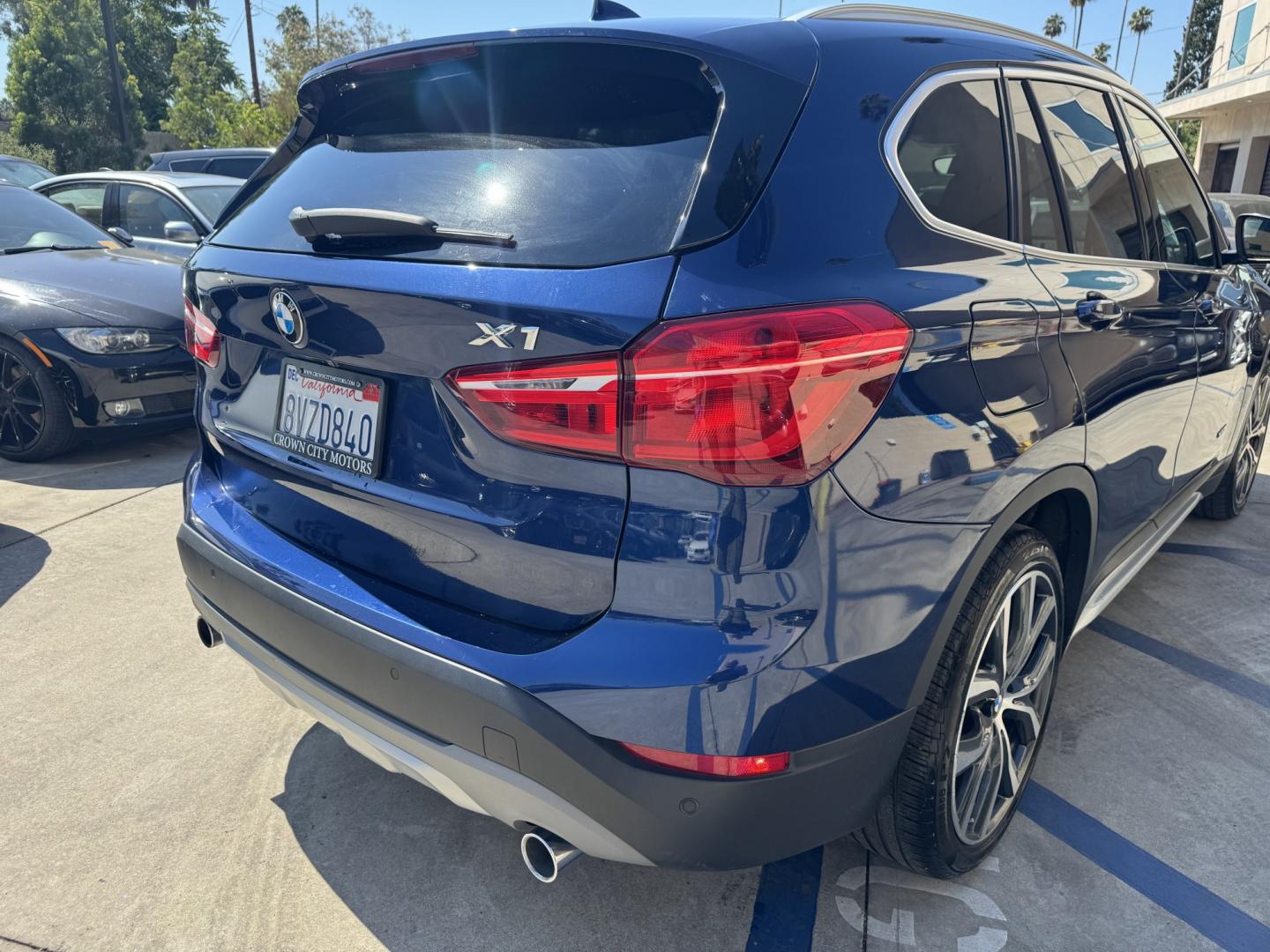 2018 Mediterranean Blue Metallic /Black BMW X1 xDrive28i (WBXHT3C32J5) with an 2.0L L4 DOHC 16V engine, 8A transmission, located at 30 S. Berkeley Avenue, Pasadena, CA, 91107, (626) 248-7567, 34.145447, -118.109398 - Decoding VIN WBXHT3C32J5K23620: Vehicle: 2018 BMW X1 sDrive28i (F48 Generation) Engine: 2.0L TwinPower Turbo Inline 4-Cylinder Drivetrain: Front-Wheel Drive (FWD / sDrive) Body Style: Premium Compact Luxury Sports Activity Vehicle (SAV / Crossover) A late-model luxury crossover like t- Photo#12