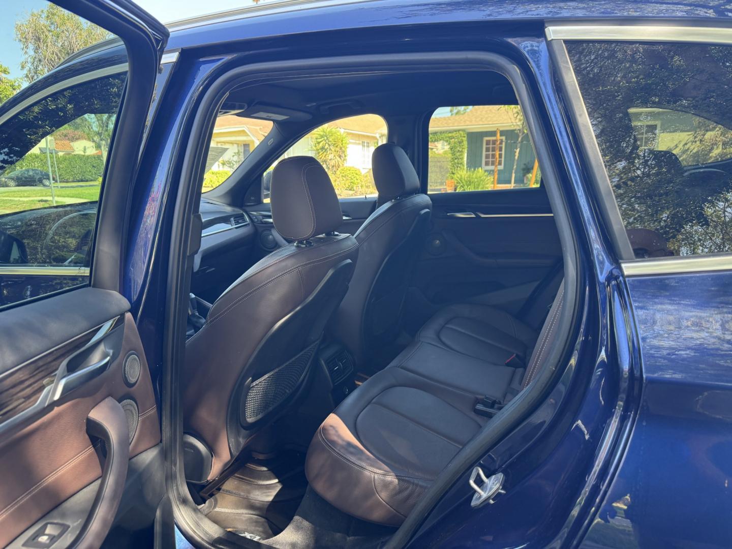 2018 Mediterranean Blue Metallic /Black BMW X1 xDrive28i (WBXHT3C32J5) with an 2.0L L4 DOHC 16V engine, 8A transmission, located at 30 S. Berkeley Avenue, Pasadena, CA, 91107, (626) 248-7567, 34.145447, -118.109398 - Decoding VIN WBXHT3C32J5K23620: Vehicle: 2018 BMW X1 sDrive28i (F48 Generation) Engine: 2.0L TwinPower Turbo Inline 4-Cylinder Drivetrain: Front-Wheel Drive (FWD / sDrive) Body Style: Premium Compact Luxury Sports Activity Vehicle (SAV / Crossover) A late-model luxury crossover like t- Photo#20