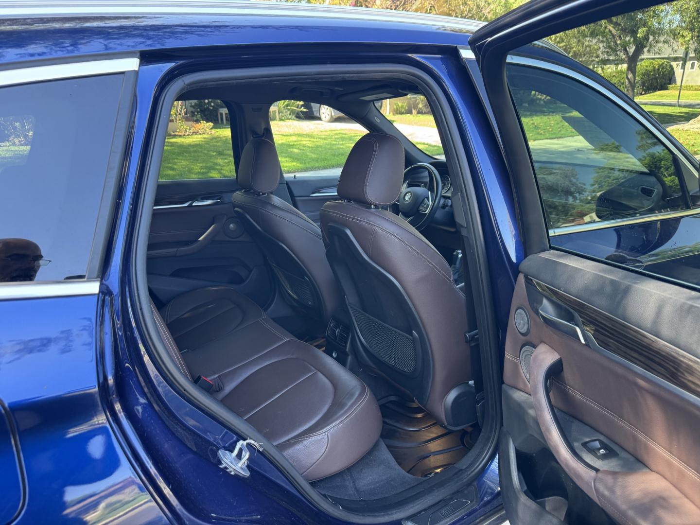2018 Mediterranean Blue Metallic /Black BMW X1 xDrive28i (WBXHT3C32J5) with an 2.0L L4 DOHC 16V engine, 8A transmission, located at 30 S. Berkeley Avenue, Pasadena, CA, 91107, (626) 248-7567, 34.145447, -118.109398 - Decoding VIN WBXHT3C32J5K23620: Vehicle: 2018 BMW X1 sDrive28i (F48 Generation) Engine: 2.0L TwinPower Turbo Inline 4-Cylinder Drivetrain: Front-Wheel Drive (FWD / sDrive) Body Style: Premium Compact Luxury Sports Activity Vehicle (SAV / Crossover) A late-model luxury crossover like t- Photo#25