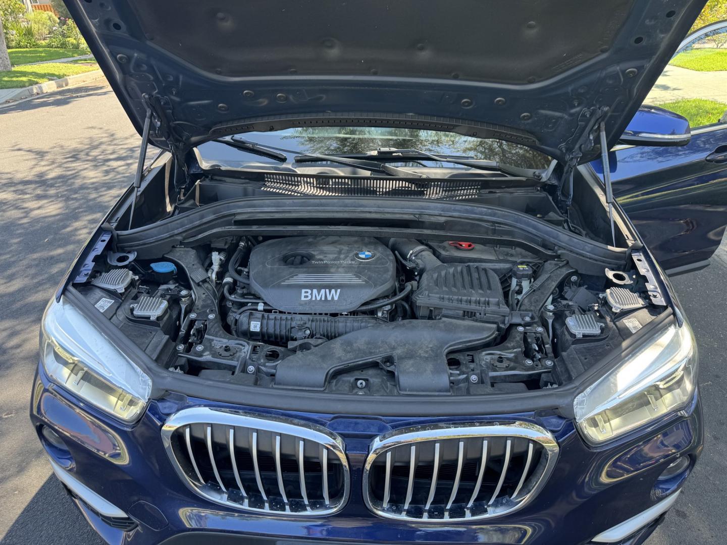 2018 Mediterranean Blue Metallic /Black BMW X1 xDrive28i (WBXHT3C32J5) with an 2.0L L4 DOHC 16V engine, 8A transmission, located at 30 S. Berkeley Avenue, Pasadena, CA, 91107, (626) 248-7567, 34.145447, -118.109398 - Decoding VIN WBXHT3C32J5K23620: Vehicle: 2018 BMW X1 sDrive28i (F48 Generation) Engine: 2.0L TwinPower Turbo Inline 4-Cylinder Drivetrain: Front-Wheel Drive (FWD / sDrive) Body Style: Premium Compact Luxury Sports Activity Vehicle (SAV / Crossover) A late-model luxury crossover like t- Photo#38