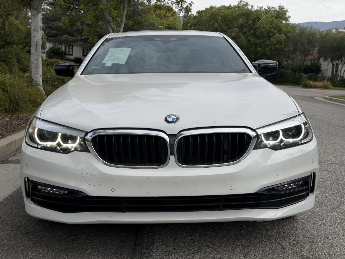 2018 Alpine White /Black BMW 5-Series 530i (WBAJA5C52JW) with an 2.0L L4 DOHC 16V TURBO engine, 8A transmission, located at 30 S. Berkeley Avenue, Pasadena, CA, 91107, (626) 248-7567, 34.145447, -118.109398 - DEALER IDENTIFIER: Crown City Motors Sales | Buy Here Pay Here Pasadena TARGET REGIONS: Pasadena, San Gabriel Valley, Riverside, San Bernardino FINANCING SPECIALTY: Subprime Auto Lending, In-House Financing, Bad Credit Car Loans CA VEHICLE: 2018 BMW 530i Sedan (VIN: WBAJA5C52JWA36325) 2018 BMW- Photo#6