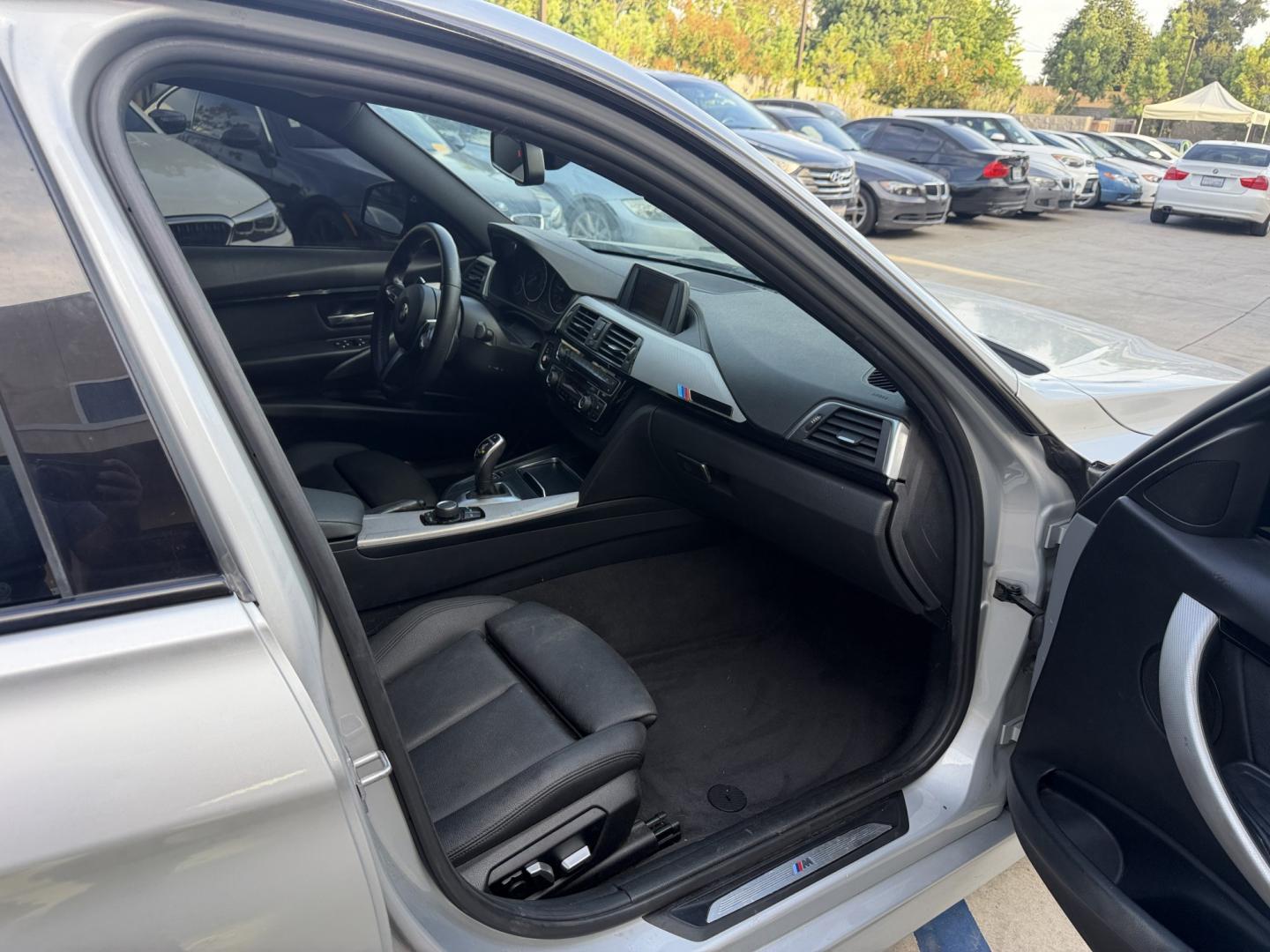 2018 Space Gray Metallic /Black BMW 3-Series 330i SULEV Sedan (WBA8B9G57JN) with an 3.0L L6 DOHC 24V engine, 8A transmission, located at 30 S. Berkeley Avenue, Pasadena, CA, 91107, (626) 248-7567, 34.145447, -118.109398 - DEALER IDENTIFIER: Crown City Motors Sales | Buy Here Pay Here Pasadena TARGET REGIONS: Pasadena, San Gabriel Valley, Riverside, San Bernardino FINANCING SPECIALTY: Subprime Auto Lending, In-House Financing, Bad Credit Car Loans CA VEHICLE: 2018 BMW 320i Sedan M Sport Appearance (VIN: WBA8B9G57JN- Photo#25