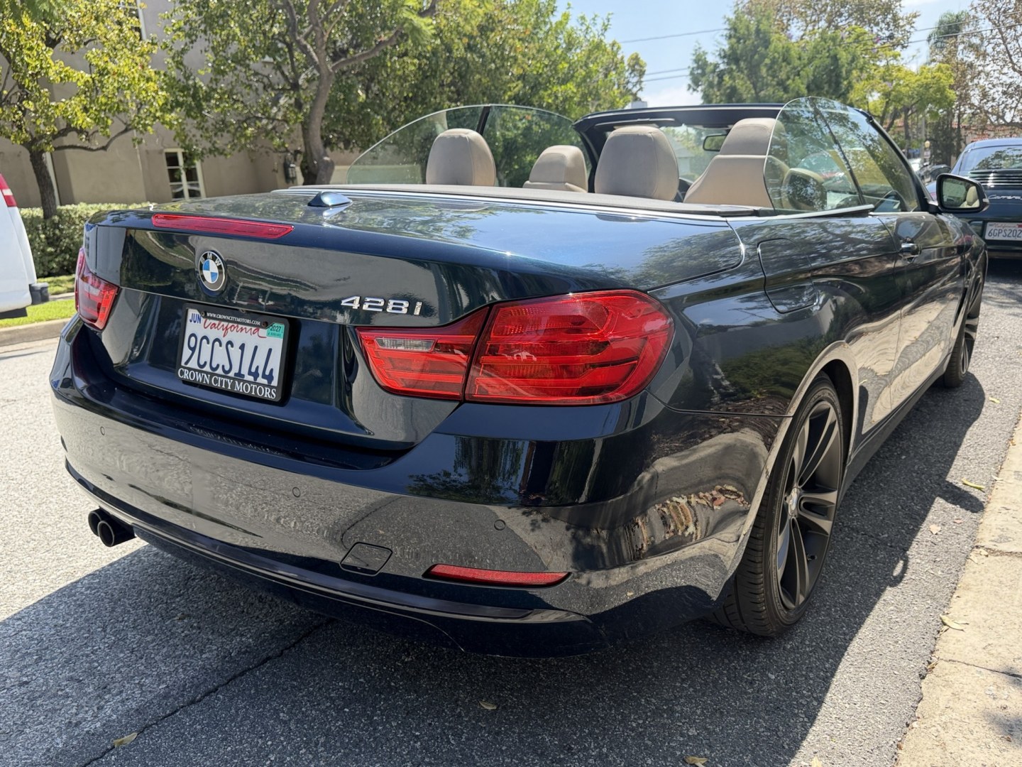 2016 Mediterranean Blue Metallic /Gray BMW 4-Series 428i SULEV Convertible (WBA3V7C56G5) with an 2.0L L4 DOHC 16V engine, 8A transmission, located at 30 S. Berkeley Avenue, Pasadena, CA, 91107, (626) 248-7567, 34.145447, -118.109398 - DEALER IDENTIFIER: Crown City Motors Sales | Buy Here Pay Here Pasadena TARGET REGIONS: Pasadena, San Gabriel Valley, Riverside, San Bernardino FINANCING SPECIALTY: Subprime Auto Lending, In-House Financing, Bad Credit Car Loans CA VEHICLE: 2016 BMW 328i Sedan (VIN: WBA3V7C56G5A26906) 2016 BMW- Photo#2