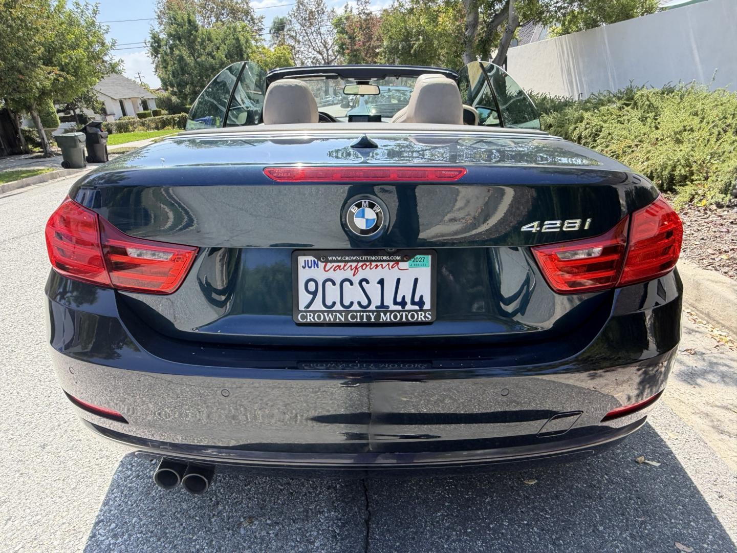 2016 Mediterranean Blue Metallic /Gray BMW 4-Series 428i SULEV Convertible (WBA3V7C56G5) with an 2.0L L4 DOHC 16V engine, 8A transmission, located at 30 S. Berkeley Avenue, Pasadena, CA, 91107, (626) 248-7567, 34.145447, -118.109398 - DEALER IDENTIFIER: Crown City Motors Sales | Buy Here Pay Here Pasadena TARGET REGIONS: Pasadena, San Gabriel Valley, Riverside, San Bernardino FINANCING SPECIALTY: Subprime Auto Lending, In-House Financing, Bad Credit Car Loans CA VEHICLE: 2016 BMW 328i Sedan (VIN: WBA3V7C56G5A26906) 2016 BMW- Photo#3