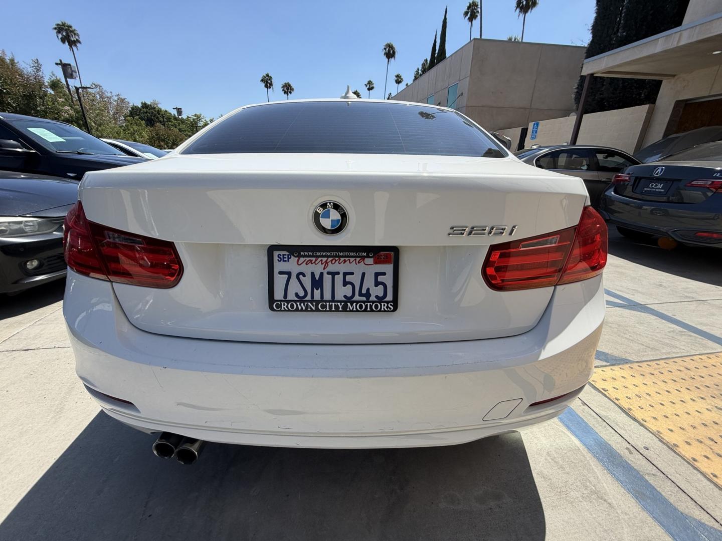 2014 Alpine White /Black BMW 3-Series 328i Sedan (WBA3C1C56EK) with an 2.0L L4 DOHC 16V engine, Automatic transmission, located at 30 S. Berkeley Avenue, Pasadena, CA, 91107, (626) 248-7567, 34.145447, -118.109398 - DEALER IDENTIFIER: Crown City Motors Sales | Buy Here Pay Here Pasadena TARGET REGIONS: Pasadena, San Gabriel Valley, Riverside, San Bernardino FINANCING SPECIALTY: Subprime Auto Lending, In-House Financing, Bad Credit Car Loans CA VEHICLE: 2014 BMW 320i Sedan (VIN: WBA3C1C56EK105247) 2014 BMW- Photo#2