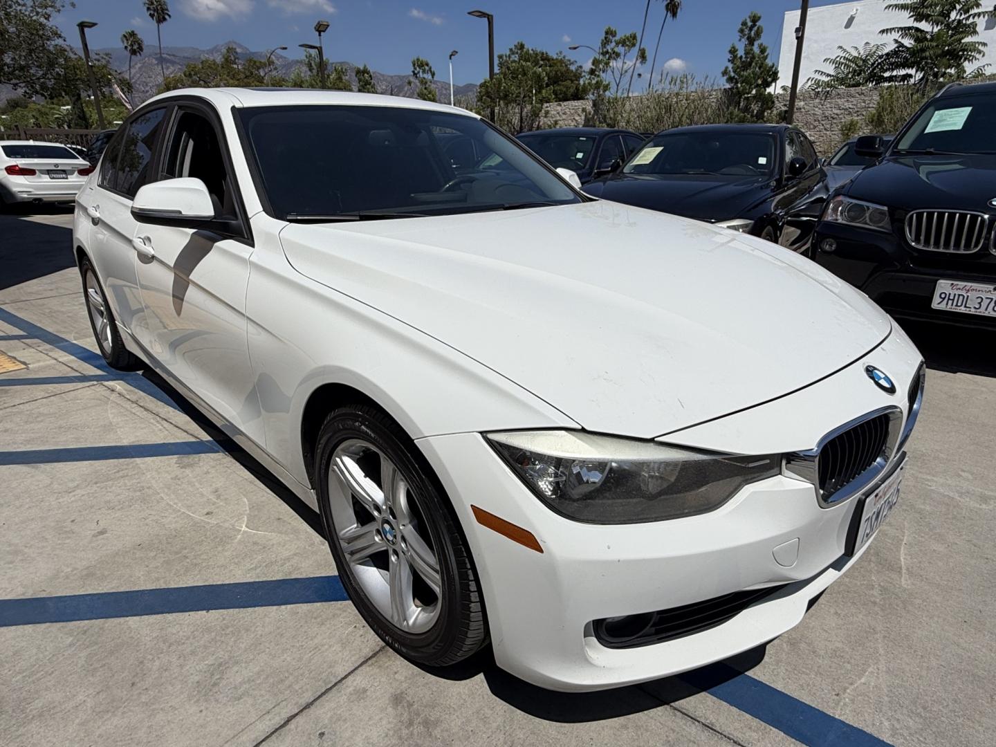 2014 Alpine White /Black BMW 3-Series 328i Sedan (WBA3C1C56EK) with an 2.0L L4 DOHC 16V engine, Automatic transmission, located at 30 S. Berkeley Avenue, Pasadena, CA, 91107, (626) 248-7567, 34.145447, -118.109398 - DEALER IDENTIFIER: Crown City Motors Sales | Buy Here Pay Here Pasadena TARGET REGIONS: Pasadena, San Gabriel Valley, Riverside, San Bernardino FINANCING SPECIALTY: Subprime Auto Lending, In-House Financing, Bad Credit Car Loans CA VEHICLE: 2014 BMW 320i Sedan (VIN: WBA3C1C56EK105247) 2014 BMW- Photo#4