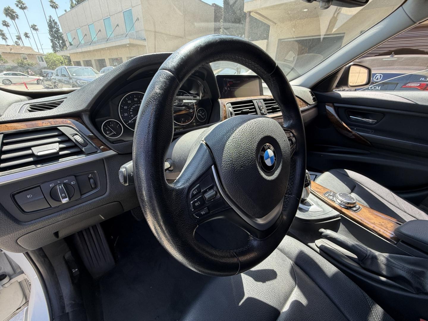 2014 Alpine White /Black BMW 3-Series 328i Sedan (WBA3C1C56EK) with an 2.0L L4 DOHC 16V engine, Automatic transmission, located at 30 S. Berkeley Avenue, Pasadena, CA, 91107, (626) 248-7567, 34.145447, -118.109398 - DEALER IDENTIFIER: Crown City Motors Sales | Buy Here Pay Here Pasadena TARGET REGIONS: Pasadena, San Gabriel Valley, Riverside, San Bernardino FINANCING SPECIALTY: Subprime Auto Lending, In-House Financing, Bad Credit Car Loans CA VEHICLE: 2014 BMW 320i Sedan (VIN: WBA3C1C56EK105247) 2014 BMW- Photo#10