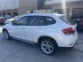 2014 Alpine White BMW X1 xDrive28i (WBAVL1C58EV) with an 2.0L L4 DOHC 16V engine, 8-Speed Automatic transmission, located at 30 S. Berkeley Avenue, Pasadena, CA, 91107, (626) 248-7567, 34.145447, -118.109398 - DEALER IDENTIFIER: Crown City Motors Sales | Buy Here Pay Here Pasadena TARGET REGIONS: Pasadena, San Gabriel Valley, Riverside, San Bernardino FINANCING SPECIALTY: Subprime Auto Lending, In-House Financing, Bad Credit Car Loans CA VEHICLE: 2014 BMW X1 xDrive28i AWD (VIN: WBAVL1C58EVY15967) 20- Photo#5