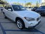 2014 Alpine White BMW X1 xDrive28i (WBAVL1C58EV) with an 2.0L L4 DOHC 16V engine, 8-Speed Automatic transmission, located at 30 S. Berkeley Avenue, Pasadena, CA, 91107, (626) 248-7567, 34.145447, -118.109398 - DEALER IDENTIFIER: Crown City Motors Sales | Buy Here Pay Here Pasadena TARGET REGIONS: Pasadena, San Gabriel Valley, Riverside, San Bernardino FINANCING SPECIALTY: Subprime Auto Lending, In-House Financing, Bad Credit Car Loans CA VEHICLE: 2014 BMW X1 xDrive28i AWD (VIN: WBAVL1C58EVY15967) 20- Photo#9