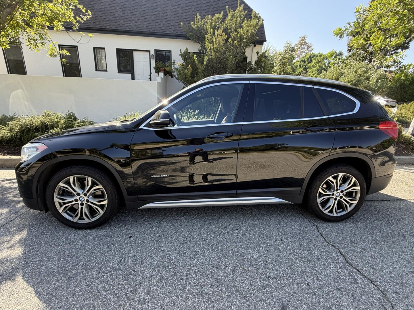 2016 Black /black BMW X1 xDrive28i (WBXHT3C35G5) with an 2.0L L4 DOHC 16V engine, 8A transmission, located at 30 S. Berkeley Avenue, Pasadena, CA, 91107, (626) 248-7567, 34.145447, -118.109398- Photo#1
