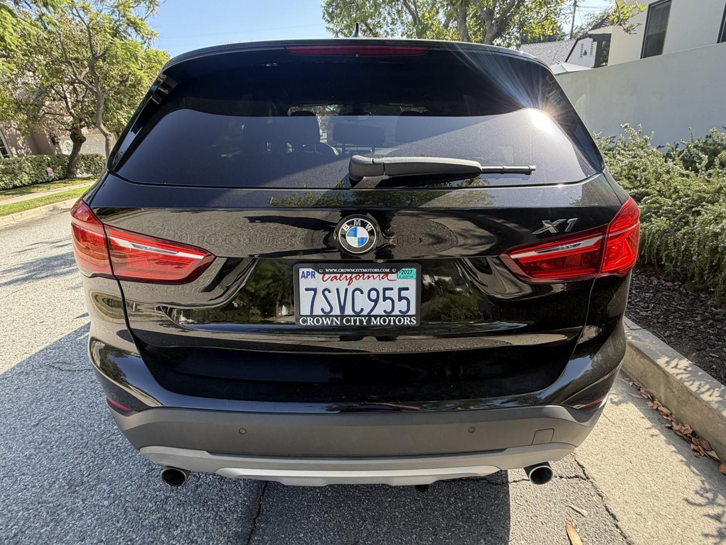 2016 Black /black BMW X1 xDrive28i (WBXHT3C35G5) with an 2.0L L4 DOHC 16V engine, 8A transmission, located at 30 S. Berkeley Avenue, Pasadena, CA, 91107, (626) 248-7567, 34.145447, -118.109398- Photo#3