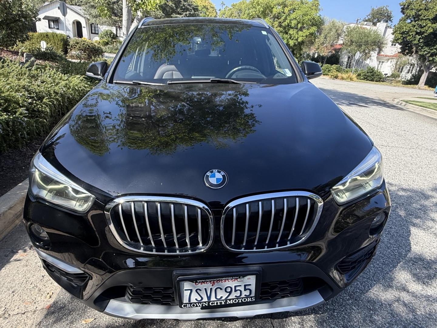 2016 Black /black BMW X1 xDrive28i (WBXHT3C35G5) with an 2.0L L4 DOHC 16V engine, 8A transmission, located at 30 S. Berkeley Avenue, Pasadena, CA, 91107, (626) 248-7567, 34.145447, -118.109398- Photo#6