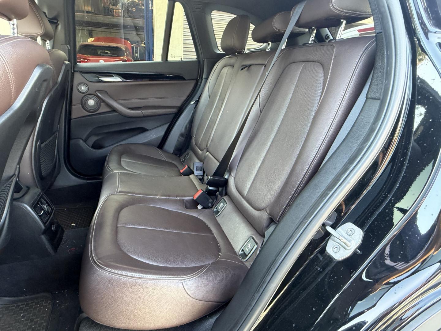 2016 Black /black BMW X1 xDrive28i (WBXHT3C35G5) with an 2.0L L4 DOHC 16V engine, 8A transmission, located at 30 S. Berkeley Avenue, Pasadena, CA, 91107, (626) 248-7567, 34.145447, -118.109398- Photo#8