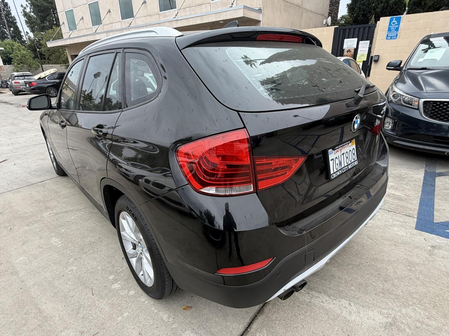2014 Black /Black BMW X1 xDrive28i (WBAVL1C51EV) with an 2.0L L4 DOHC 16V engine, 8-Speed Automatic transmission, located at 30 S. Berkeley Avenue, Pasadena, CA, 91107, (626) 248-7567, 34.145447, -118.109398 - 2014 BMW X1 sDrive28i (Black on Black) – Pasadena Buy Here Pay Here | In-House Financing & Guaranteed Approval List Price: $7,795 | Dealer Document Fee: +$85.00 | Electronic Filing Fee: +$37.00 | Crown City Motors Price: $7,917 Drive today with bad credit, no credit, repossession, or bankruptc- Photo#2
