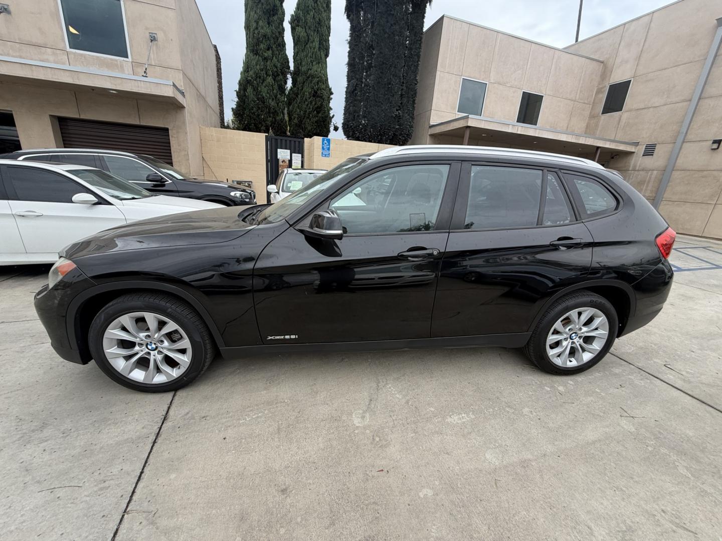 2014 Black /Black BMW X1 xDrive28i (WBAVL1C51EV) with an 2.0L L4 DOHC 16V engine, 8-Speed Automatic transmission, located at 30 S. Berkeley Avenue, Pasadena, CA, 91107, (626) 248-7567, 34.145447, -118.109398 - 2014 BMW X1 sDrive28i (Black on Black) – Pasadena Buy Here Pay Here | In-House Financing & Guaranteed Approval List Price: $7,795 | Dealer Document Fee: +$85.00 | Electronic Filing Fee: +$37.00 | Crown City Motors Price: $7,917 Drive today with bad credit, no credit, repossession, or bankruptc- Photo#1