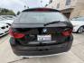 2014 Black /Black BMW X1 xDrive28i (WBAVL1C51EV) with an 2.0L L4 DOHC 16V engine, 8-Speed Automatic transmission, located at 30 S. Berkeley Avenue, Pasadena, CA, 91107, (626) 248-7567, 34.145447, -118.109398 - 2014 BMW X1 sDrive28i (Black on Black) – Pasadena Buy Here Pay Here | In-House Financing & Guaranteed Approval List Price: $7,795 | Dealer Document Fee: +$85.00 | Electronic Filing Fee: +$37.00 | Crown City Motors Price: $7,917 Drive today with bad credit, no credit, repossession, or bankruptc- Photo#3
