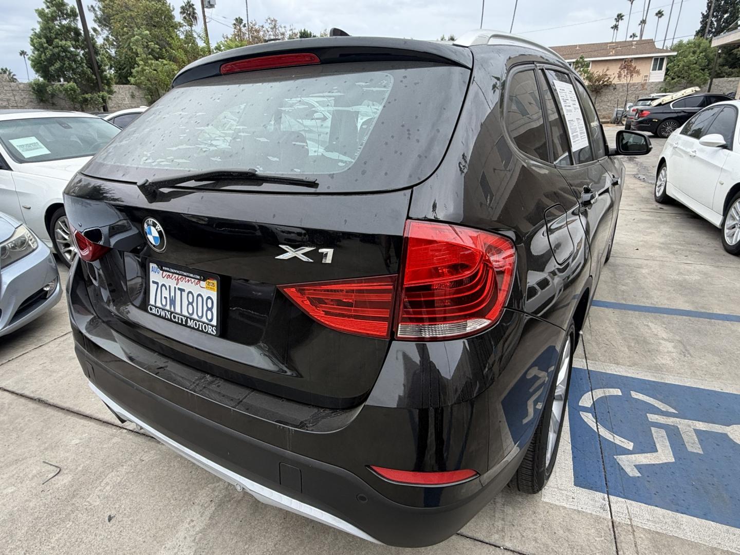 2014 Black /Black BMW X1 xDrive28i (WBAVL1C51EV) with an 2.0L L4 DOHC 16V engine, 8-Speed Automatic transmission, located at 30 S. Berkeley Avenue, Pasadena, CA, 91107, (626) 248-7567, 34.145447, -118.109398 - 2014 BMW X1 sDrive28i (Black on Black) – Pasadena Buy Here Pay Here | In-House Financing & Guaranteed Approval List Price: $7,795 | Dealer Document Fee: +$85.00 | Electronic Filing Fee: +$37.00 | Crown City Motors Price: $7,917 Drive today with bad credit, no credit, repossession, or bankruptc- Photo#4