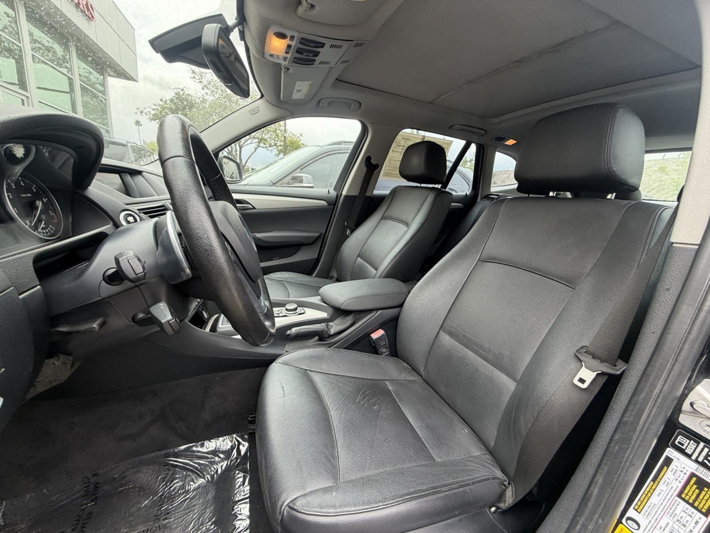 2014 Black /Black BMW X1 xDrive28i (WBAVL1C51EV) with an 2.0L L4 DOHC 16V engine, 8-Speed Automatic transmission, located at 30 S. Berkeley Avenue, Pasadena, CA, 91107, (626) 248-7567, 34.145447, -118.109398 - 2014 BMW X1 sDrive28i (Black on Black) – Pasadena Buy Here Pay Here | In-House Financing & Guaranteed Approval List Price: $7,795 | Dealer Document Fee: +$85.00 | Electronic Filing Fee: +$37.00 | Crown City Motors Price: $7,917 Drive today with bad credit, no credit, repossession, or bankruptc- Photo#7