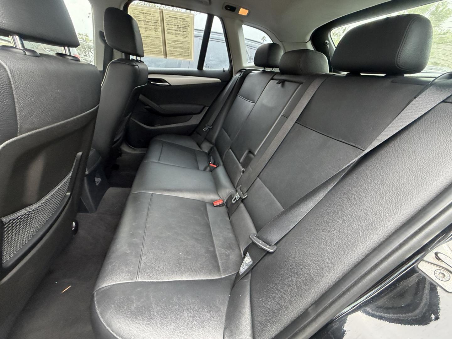 2014 Black /Black BMW X1 xDrive28i (WBAVL1C51EV) with an 2.0L L4 DOHC 16V engine, 8-Speed Automatic transmission, located at 30 S. Berkeley Avenue, Pasadena, CA, 91107, (626) 248-7567, 34.145447, -118.109398 - 2014 BMW X1 sDrive28i (Black on Black) – Pasadena Buy Here Pay Here | In-House Financing & Guaranteed Approval List Price: $7,795 | Dealer Document Fee: +$85.00 | Electronic Filing Fee: +$37.00 | Crown City Motors Price: $7,917 Drive today with bad credit, no credit, repossession, or bankruptc- Photo#8